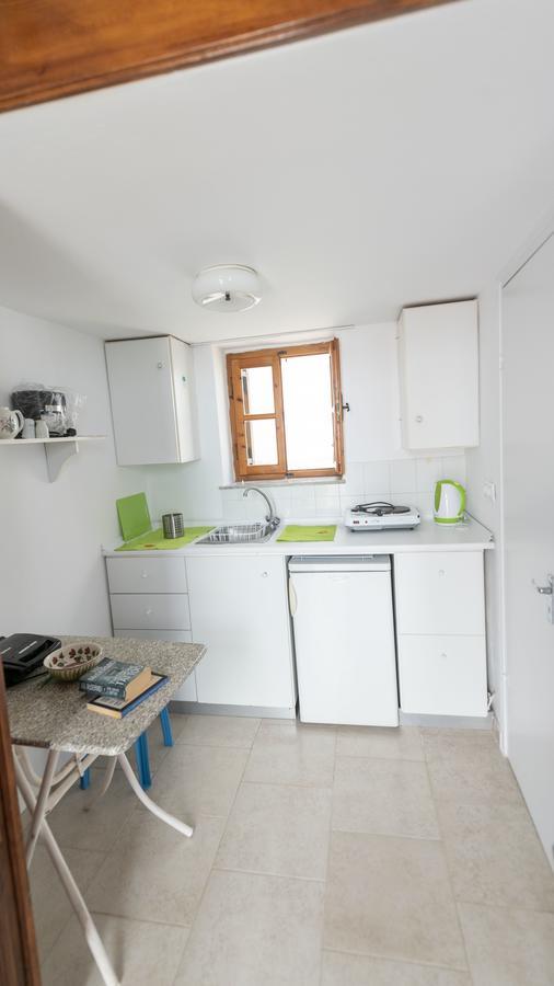 Roulas Apartments Chalki Town Exterior foto
